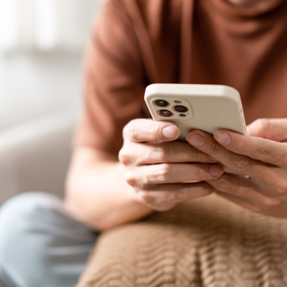 person using their iphone